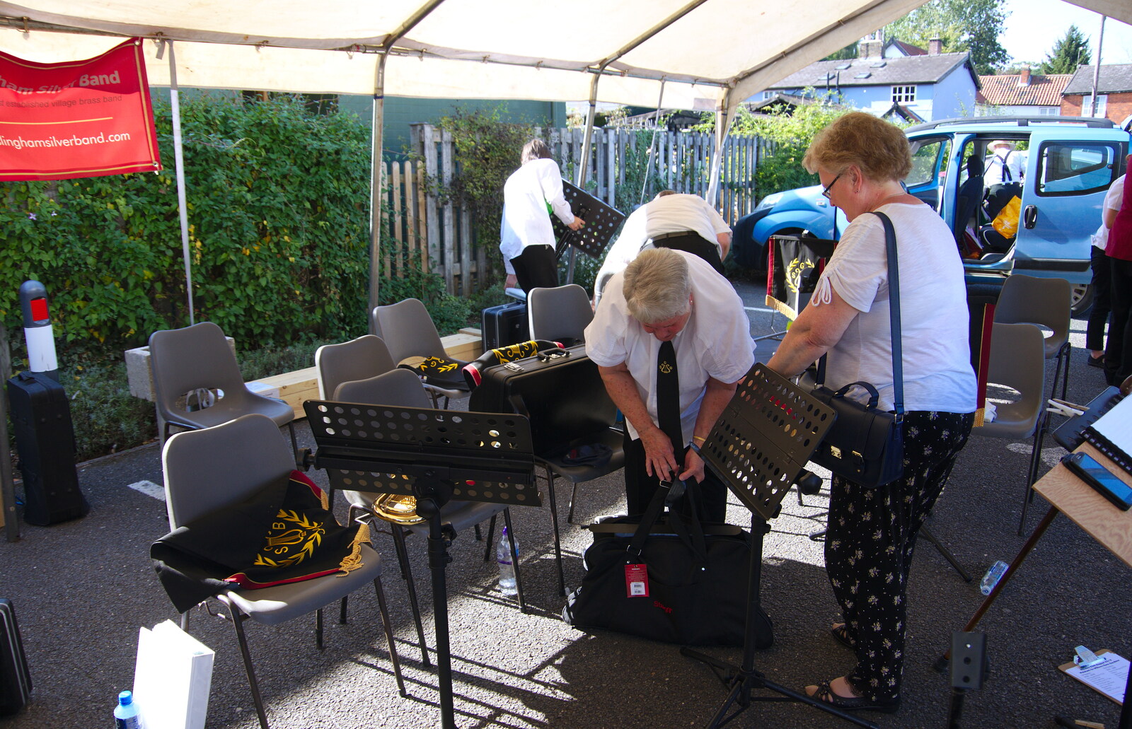 The band packs up after the gig in a carpark from The Gislingham Silver Band at Walsham Le Willows, Suffolk - 26th August 2019