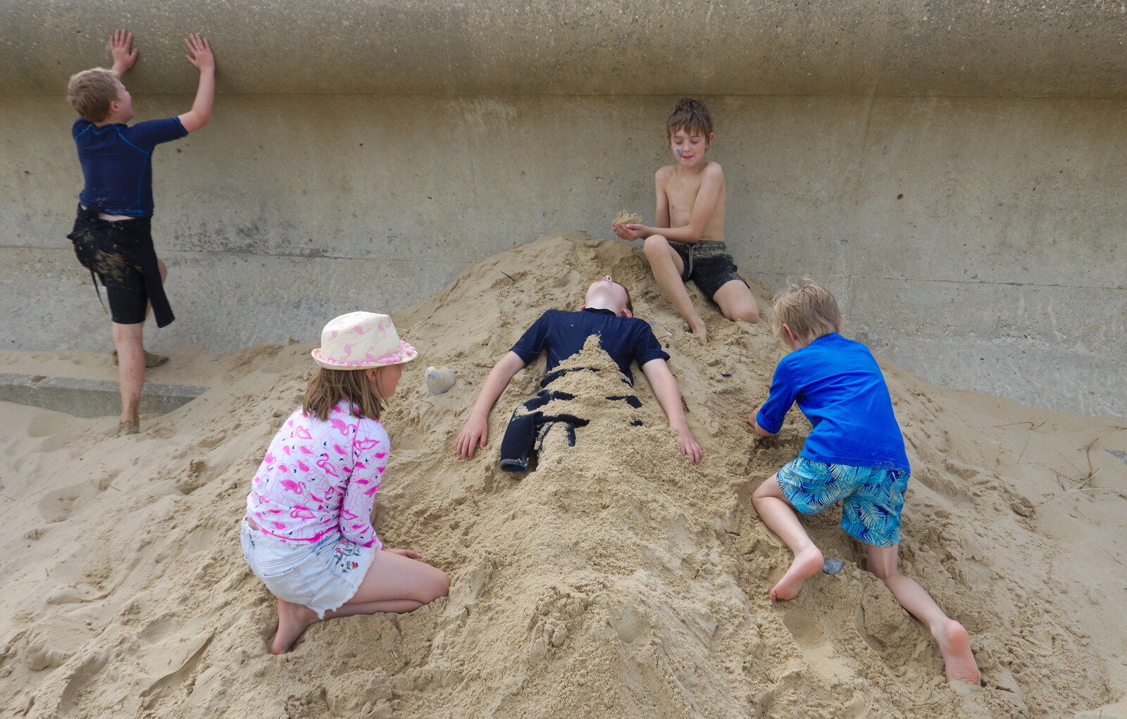 One of the boys is buried in sand from Waxham Sands and the Nelson Head Beer Festival, Horsey, Norfolk - 31st August 2019