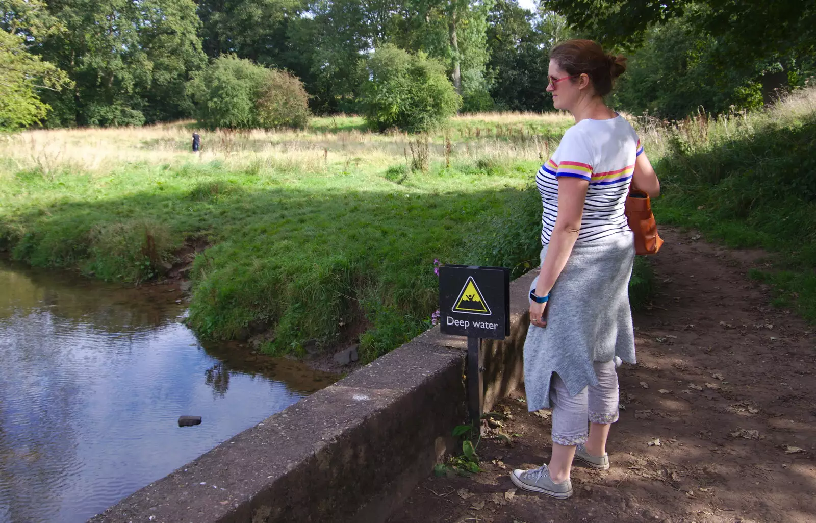 Isobel looks out over a stream, from Kenilworth Castle and the 69th Entry Reunion Dinner, Stratford, Warwickshire - 14th September 2019