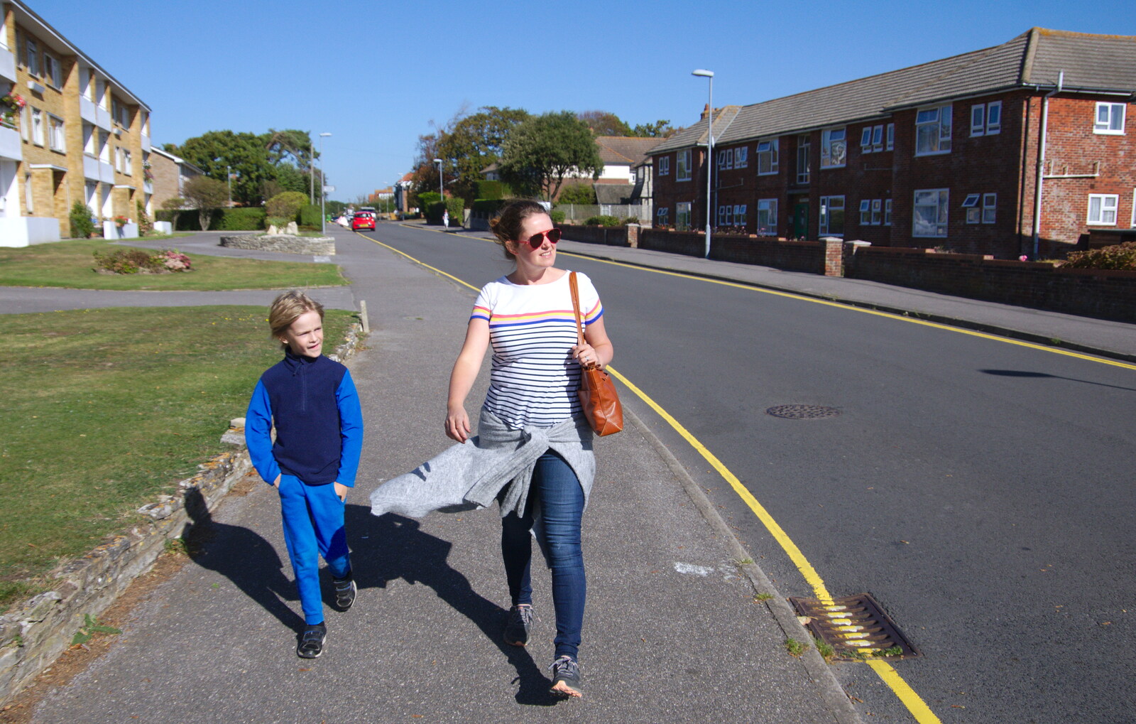 Harry and Isobel stride down Waterford Road from A Trip to the South Coast, Highcliffe, Dorset - 20th September 2019