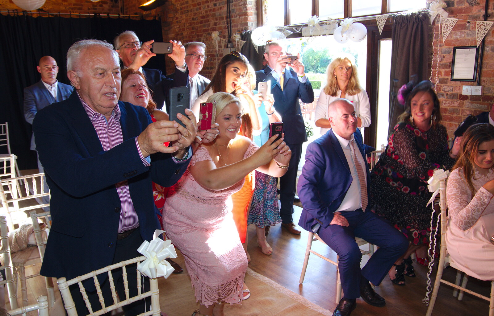 It's a full-on paparazzi moment from Neil and Martina's Wedding, The Three Tuns, Bransgore, Dorset - 20th September 2019
