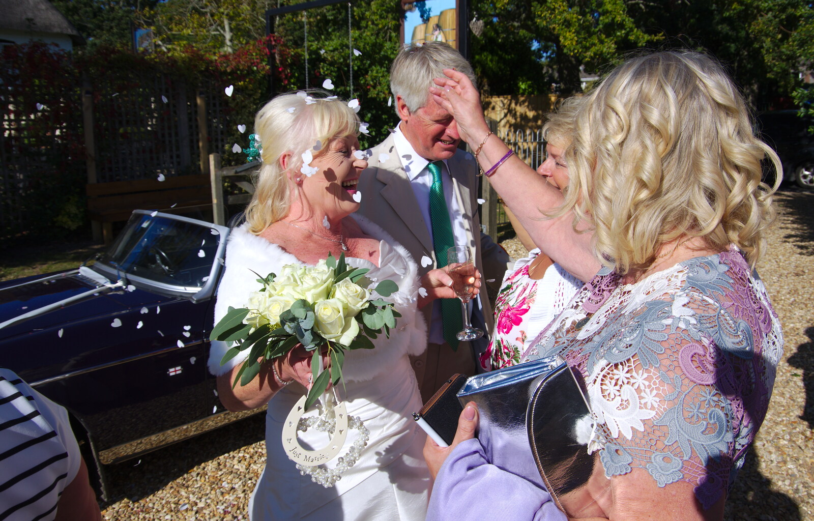 Confetti is hurled around from Neil and Martina's Wedding, The Three Tuns, Bransgore, Dorset - 20th September 2019