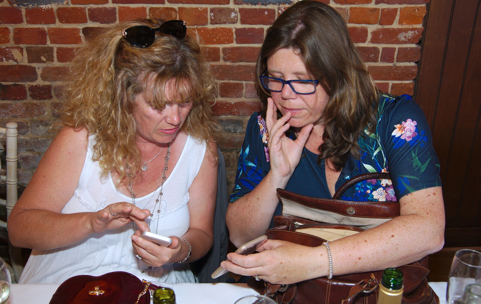 Cathy and Sis exchange phone details  from Neil and Martina's Wedding, The Three Tuns, Bransgore, Dorset - 20th September 2019
