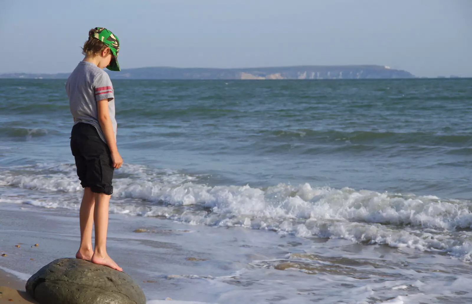 Fred stands on a rock and looks at the sea, from A Day with Sean and Michelle, Walkford, Dorset - 21st September 2019