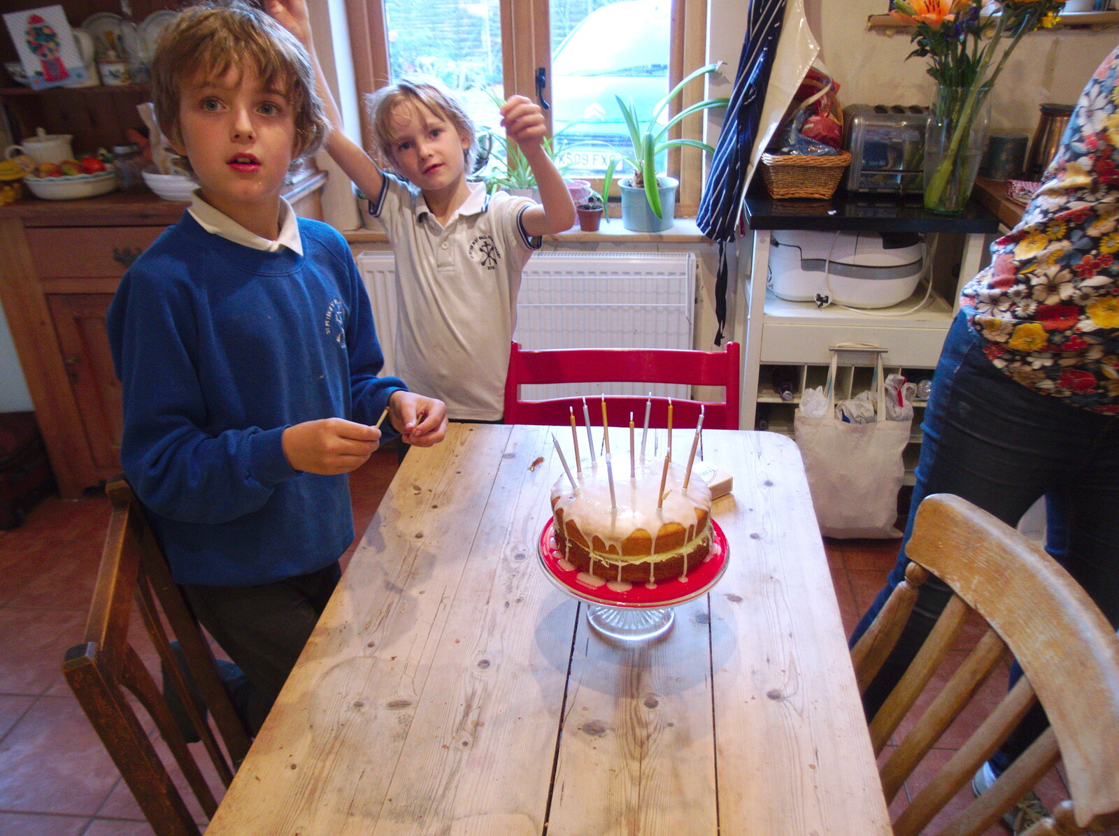 The cake is moved into the kitchen for lighting from Fred's Birthday and a GSB Duck-Race Miscellany, Brome, Eye and London - 28th September 2019
