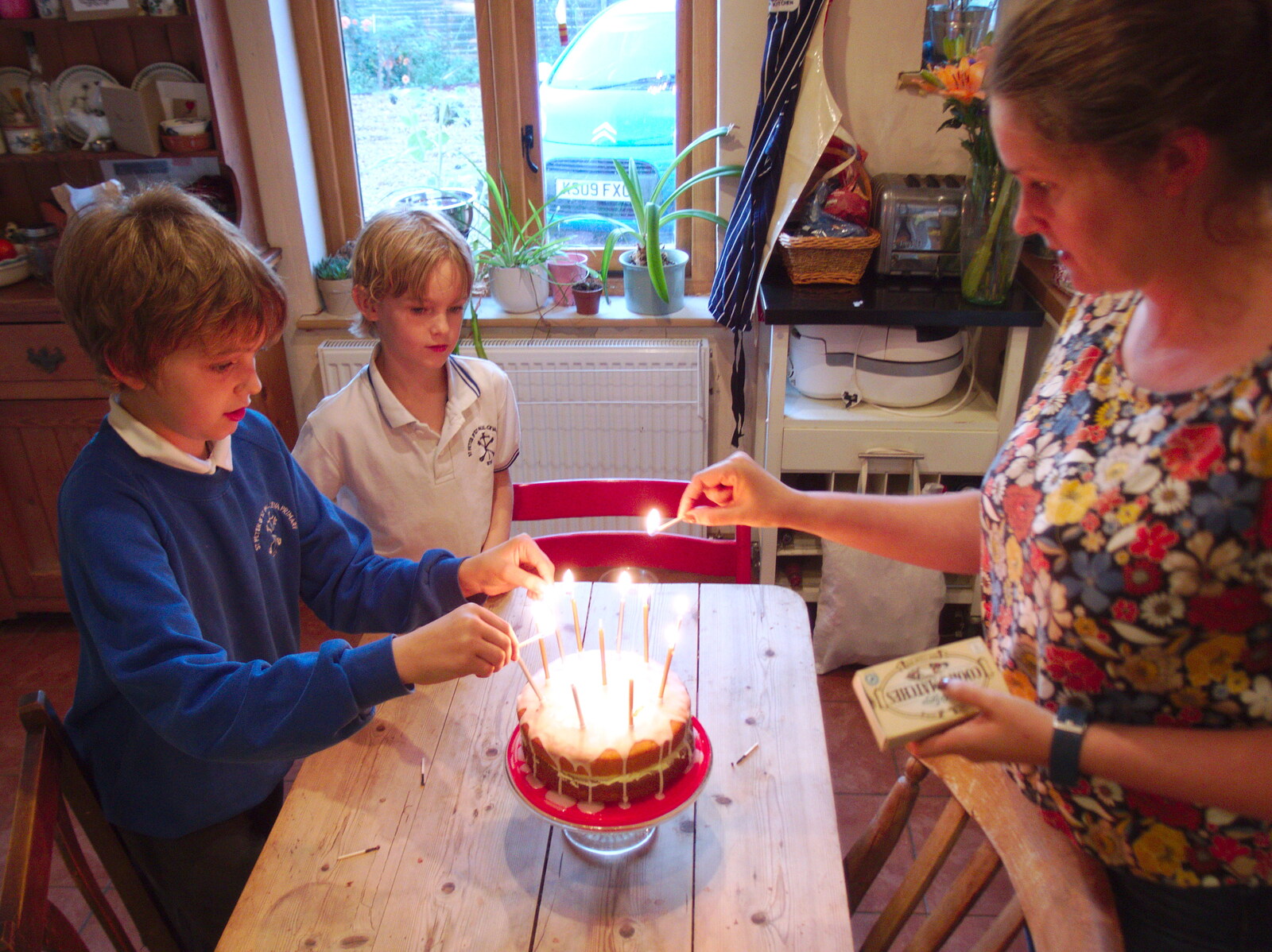 Isobel and Fred light the candles from Fred's Birthday and a GSB Duck-Race Miscellany, Brome, Eye and London - 28th September 2019