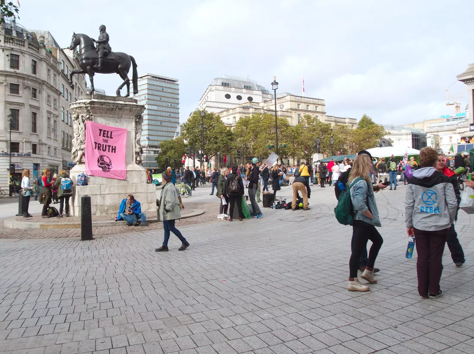 People roam around under a 'Tell the truth' banner, from The Extinction Rebellion Protest, Westminster, London - 9th October 2019