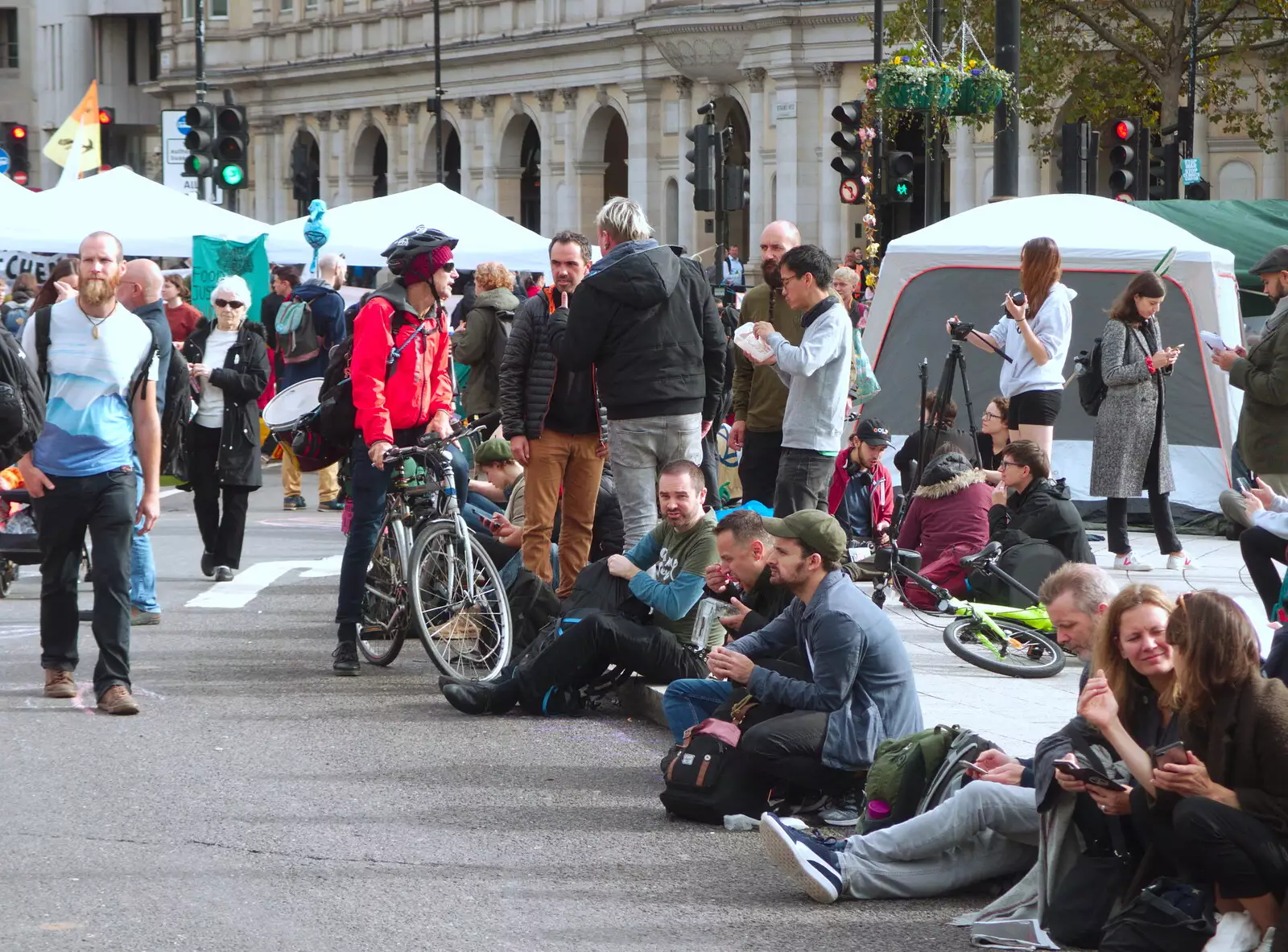 A cyclist stops for a chat, from The Extinction Rebellion Protest, Westminster, London - 9th October 2019