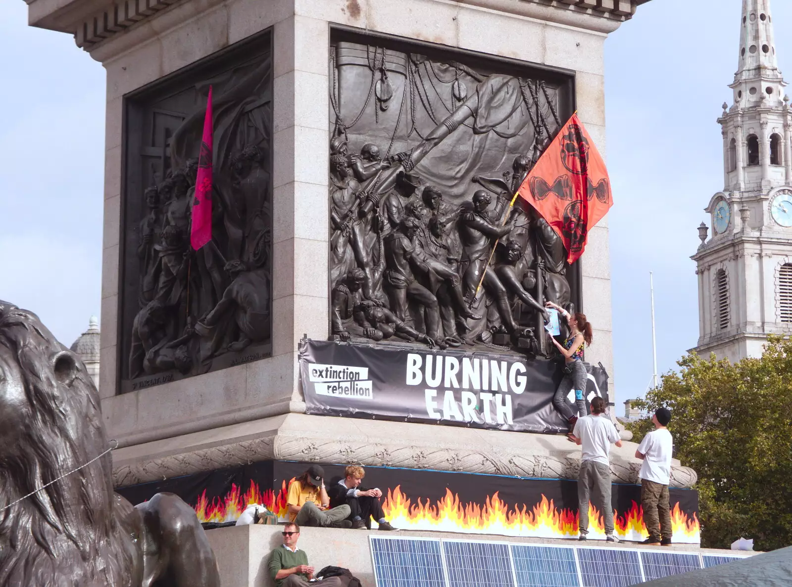 Nelson's Column gets some flags and flyers added, from The Extinction Rebellion Protest, Westminster, London - 9th October 2019