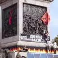 Nelson's Column gets some flags and flyers added, The Extinction Rebellion Protest, Westminster, London - 9th October 2019