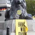 A Trafalgar lion has an XR medallion around its neck, The Extinction Rebellion Protest, Westminster, London - 9th October 2019