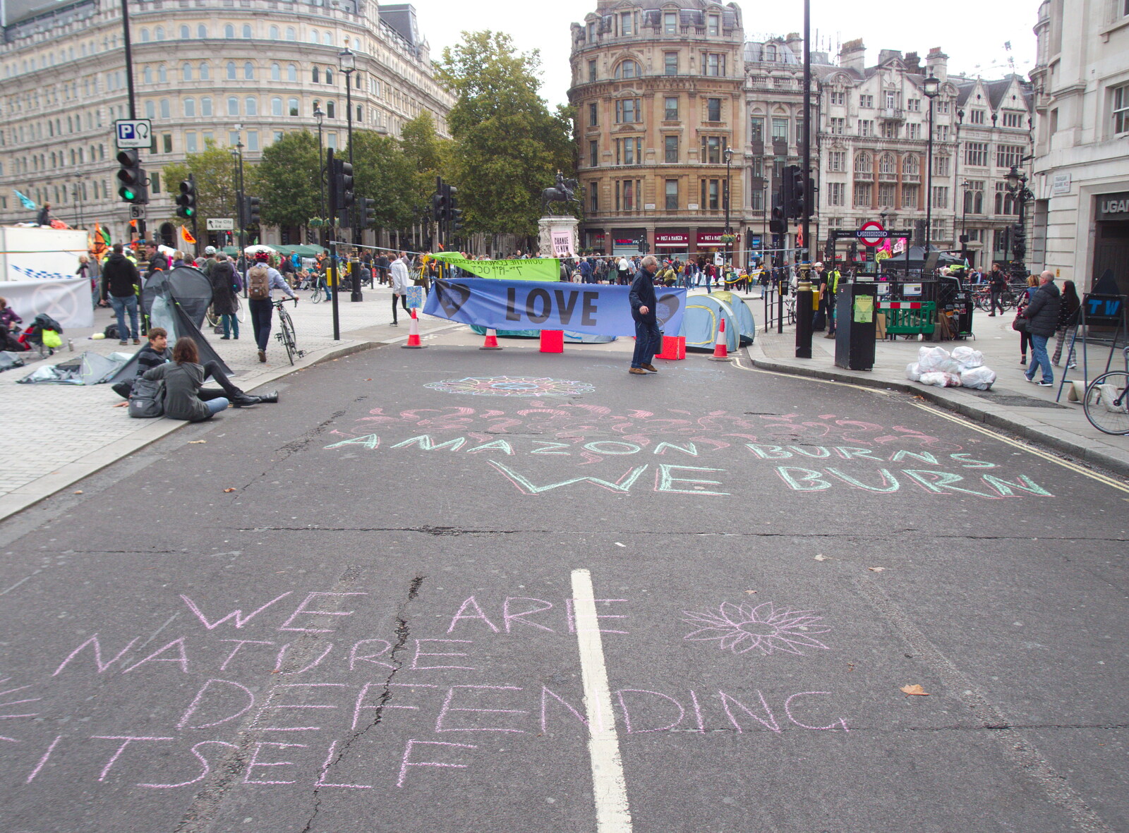 Some chalk-based protest statements from The Extinction Rebellion Protest, Westminster, London - 9th October 2019