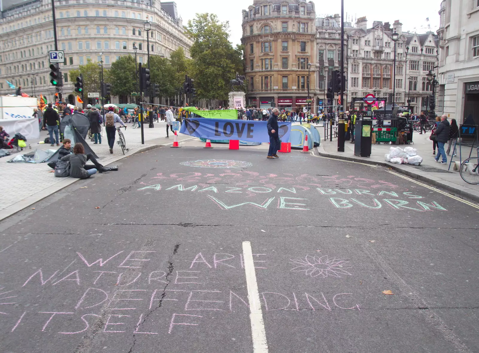 Some chalk-based protest statements, from The Extinction Rebellion Protest, Westminster, London - 9th October 2019