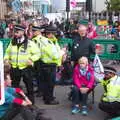 A worried-looking woman is talked to by the rozzers, The Extinction Rebellion Protest, Westminster, London - 9th October 2019