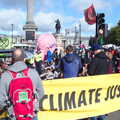 A Climate Justice banner, The Extinction Rebellion Protest, Westminster, London - 9th October 2019