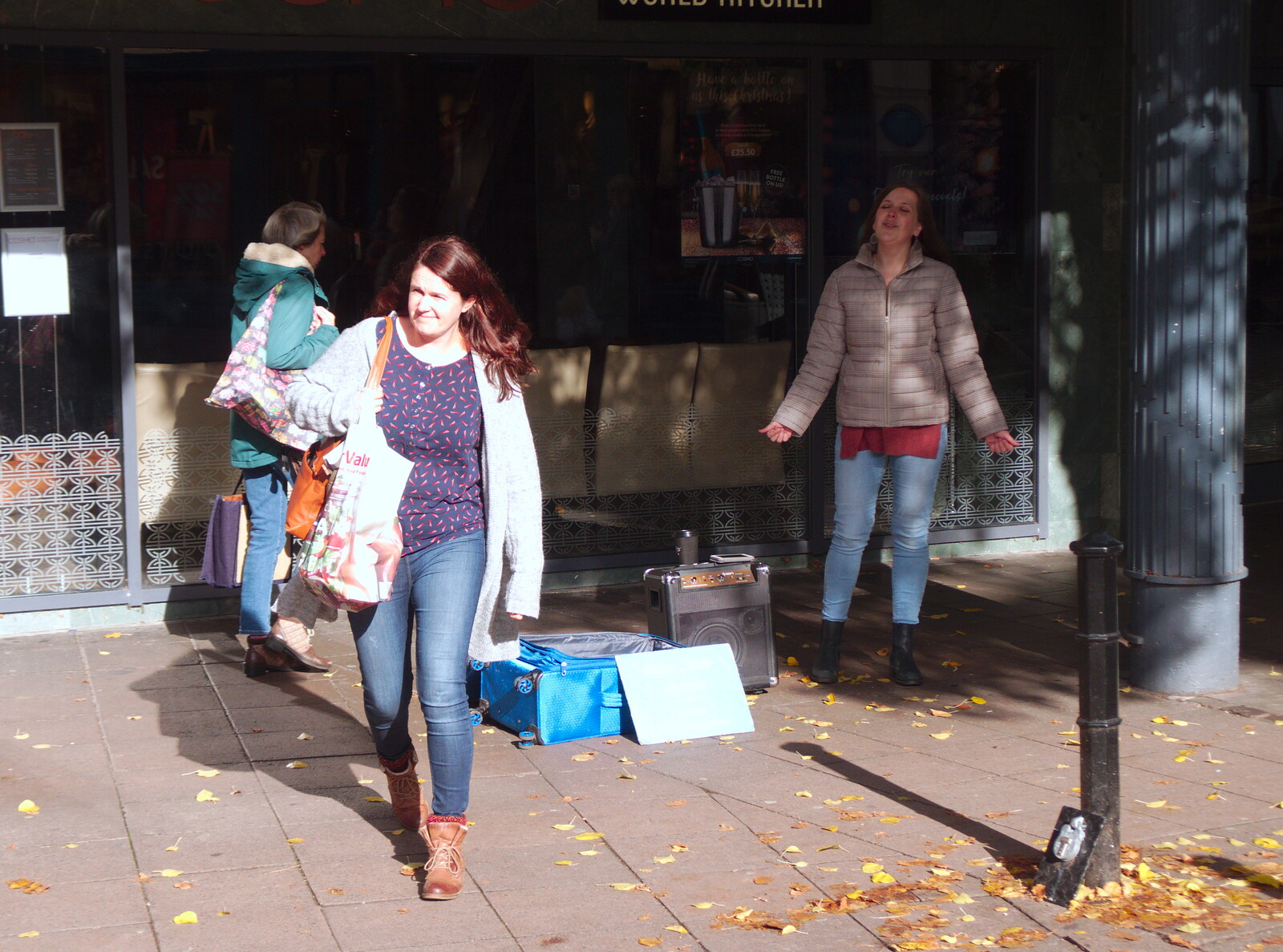 Isobel gives some money to the opera busker from A Trip up the Big City, Norwich, Norfolk - 18th October 2019