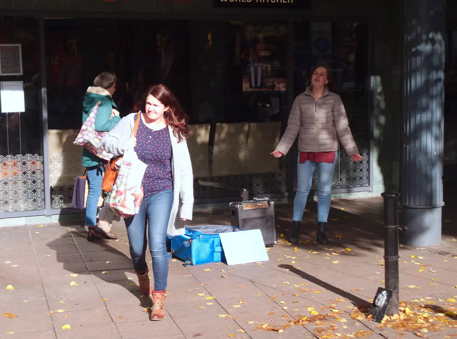 Isobel gives some money to the opera busker, from A Trip up the Big City, Norwich, Norfolk - 18th October 2019