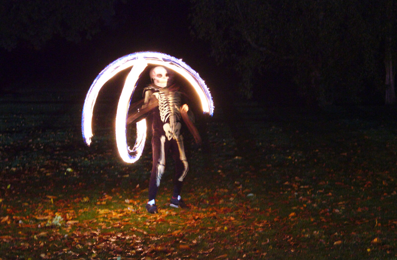 A skeleton swings fire around from Day of the Dead Party at the Oaksmere, Brome, Suffolk - 2nd November 2019
