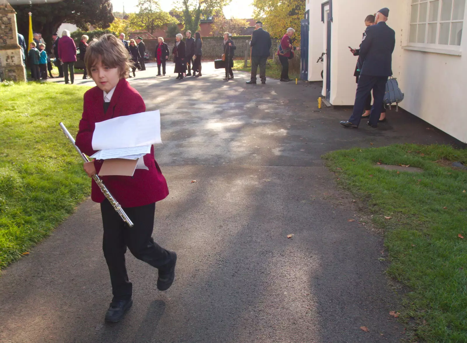 Fred legs it out of the church after the service, from The GSB at Dickleburgh, and Samia Malik at the Bank, Eye, Suffolk - 11th November 2019