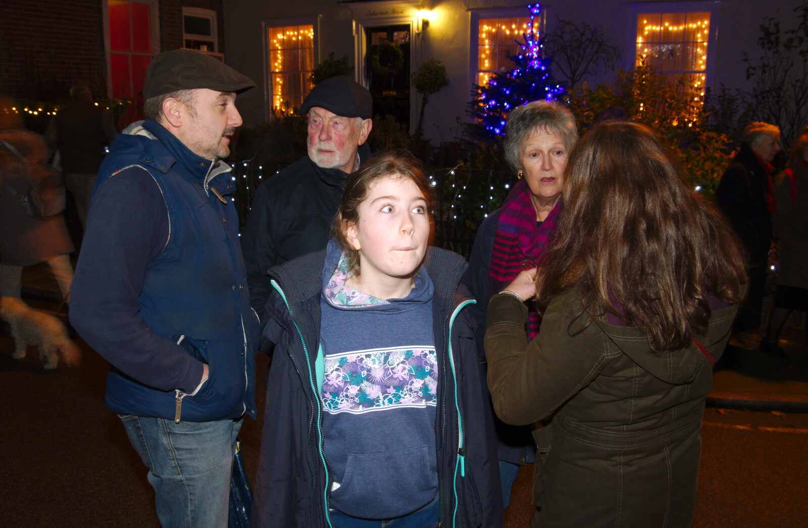Amelia twirls as Clive  chats to Colin and Jill from Isobel Sings at the Eye Lights, Eye, Suffolk - 28th November 2019