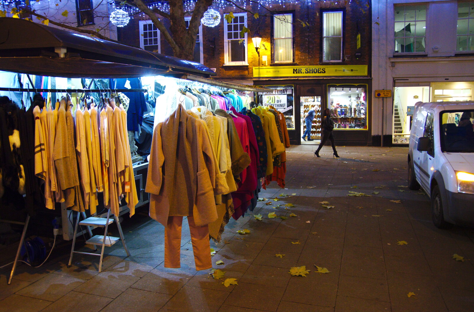 Hanging clothes on a street market stall from Pizza Express and a School Quiz, Bury St. Edmunds and Eye, Suffolk - 30th November 2019