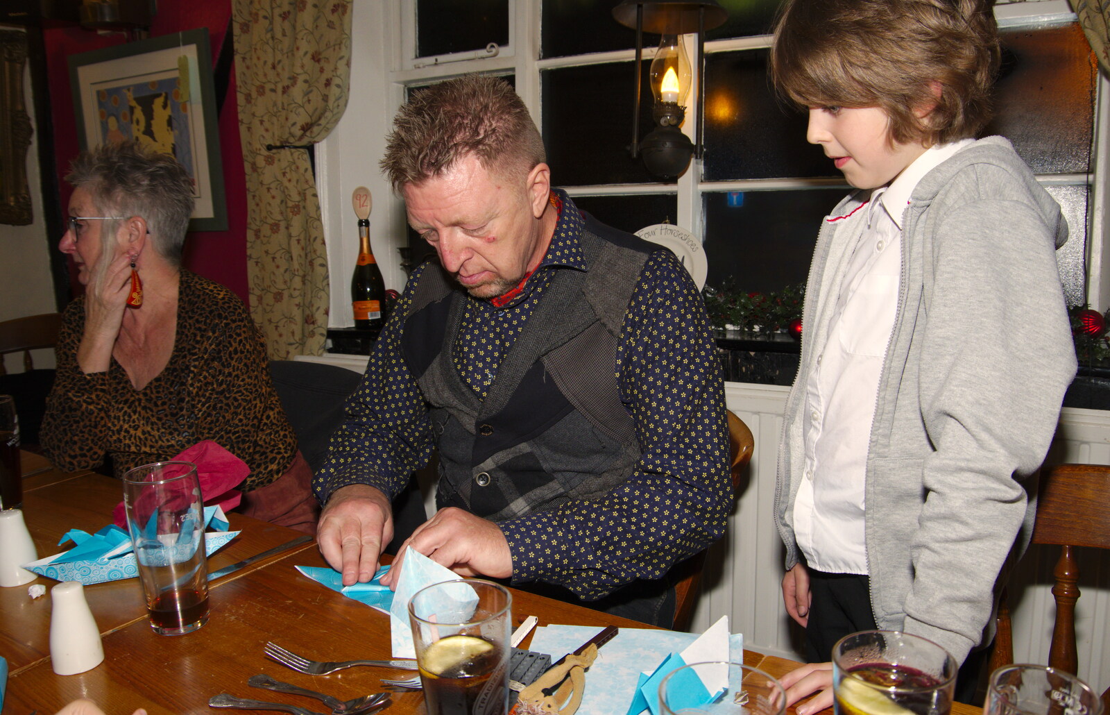Fred teaches Gaz some origami from GSB Concerts and the BSCC Christmas Dinner, Suffolk - 13th December 2019