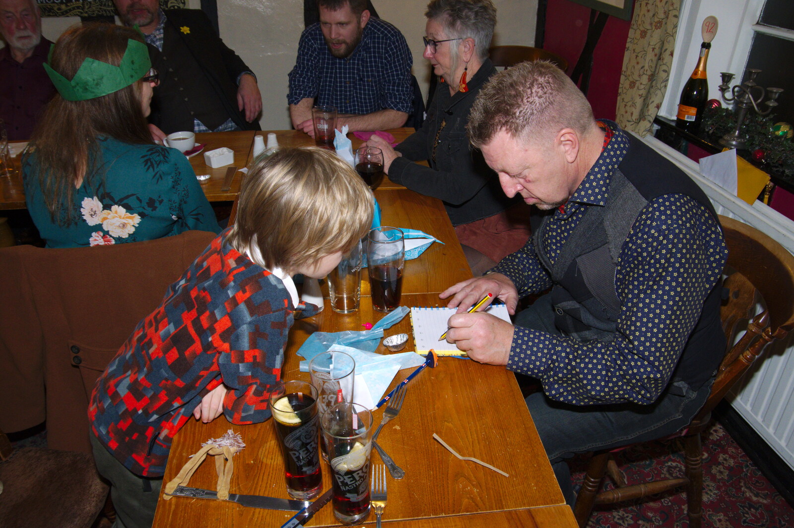 Harry and Gaz do something with paper from GSB Concerts and the BSCC Christmas Dinner, Suffolk - 13th December 2019