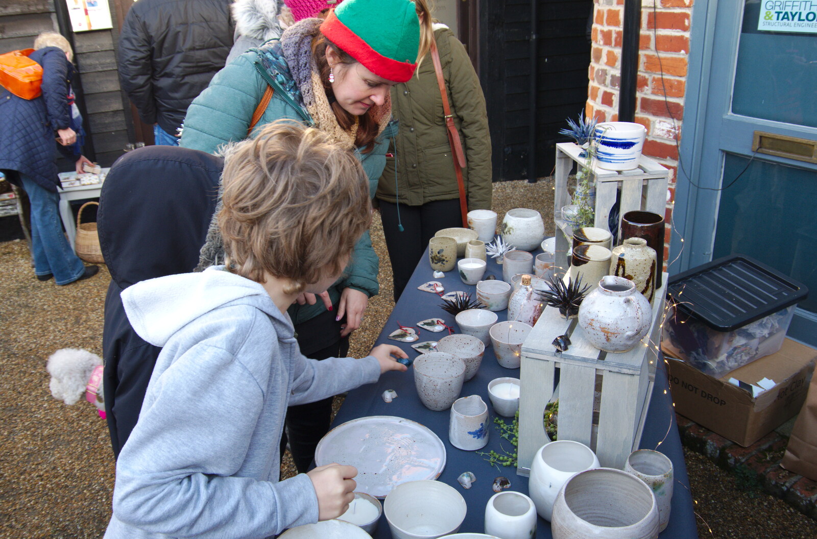 Fred looks at pottery from The St. Nicholas Street Winter Fayre, Diss, Norfolk - 14th December 2019