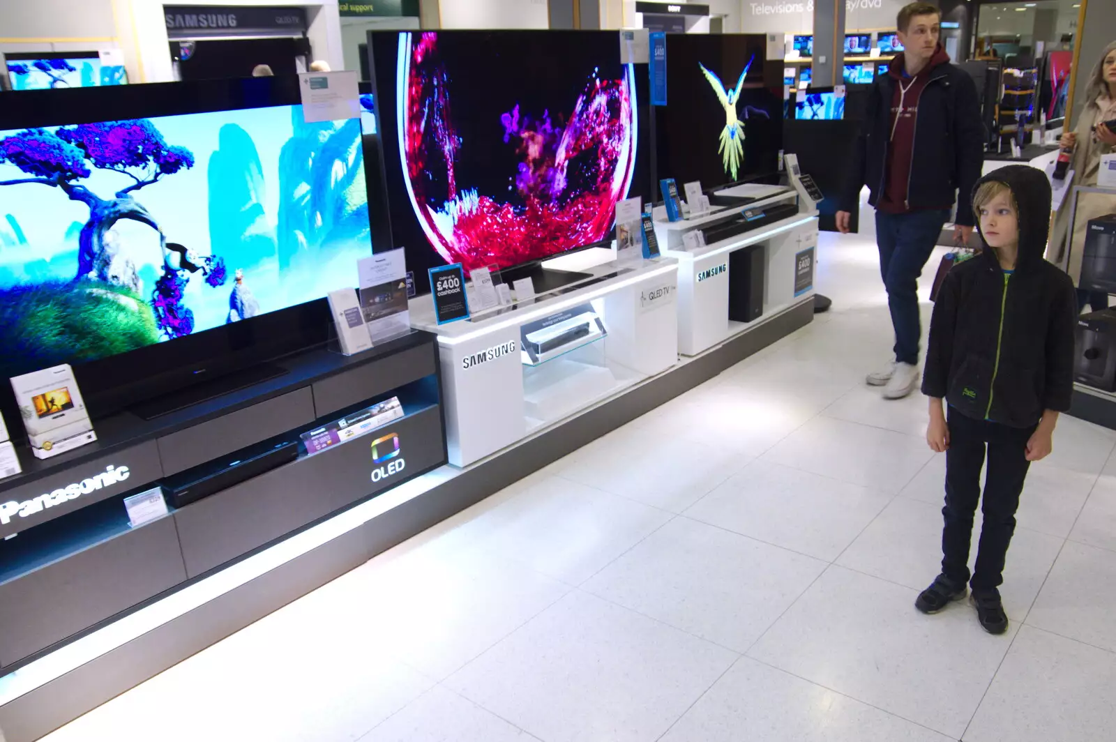 Harry looks at a load of fancy televisions, from A Spot of Christmas Shopping, Norwich, Norfolk - 23rd December 2019