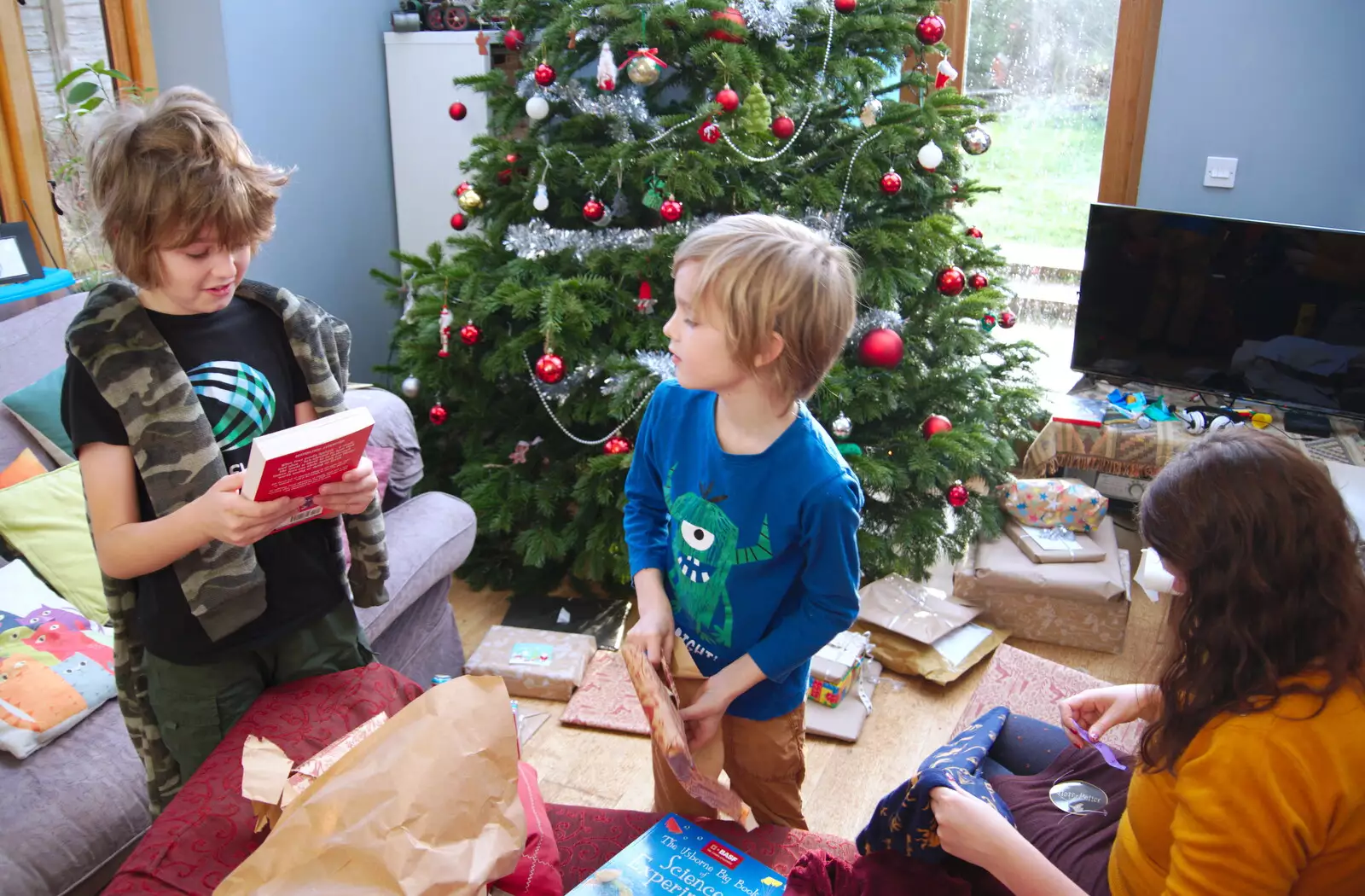 Fred's got a new book, from A Christingle Service, St. Nicholas Church, Oakley, Suffolk - 24th December 2019