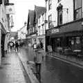 Fred wanders up a damp Mere Street, A Christingle Service, St. Nicholas Church, Oakley, Suffolk - 24th December 2019