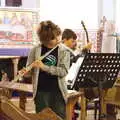 Fred blows on his flute, A Christingle Service, St. Nicholas Church, Oakley, Suffolk - 24th December 2019