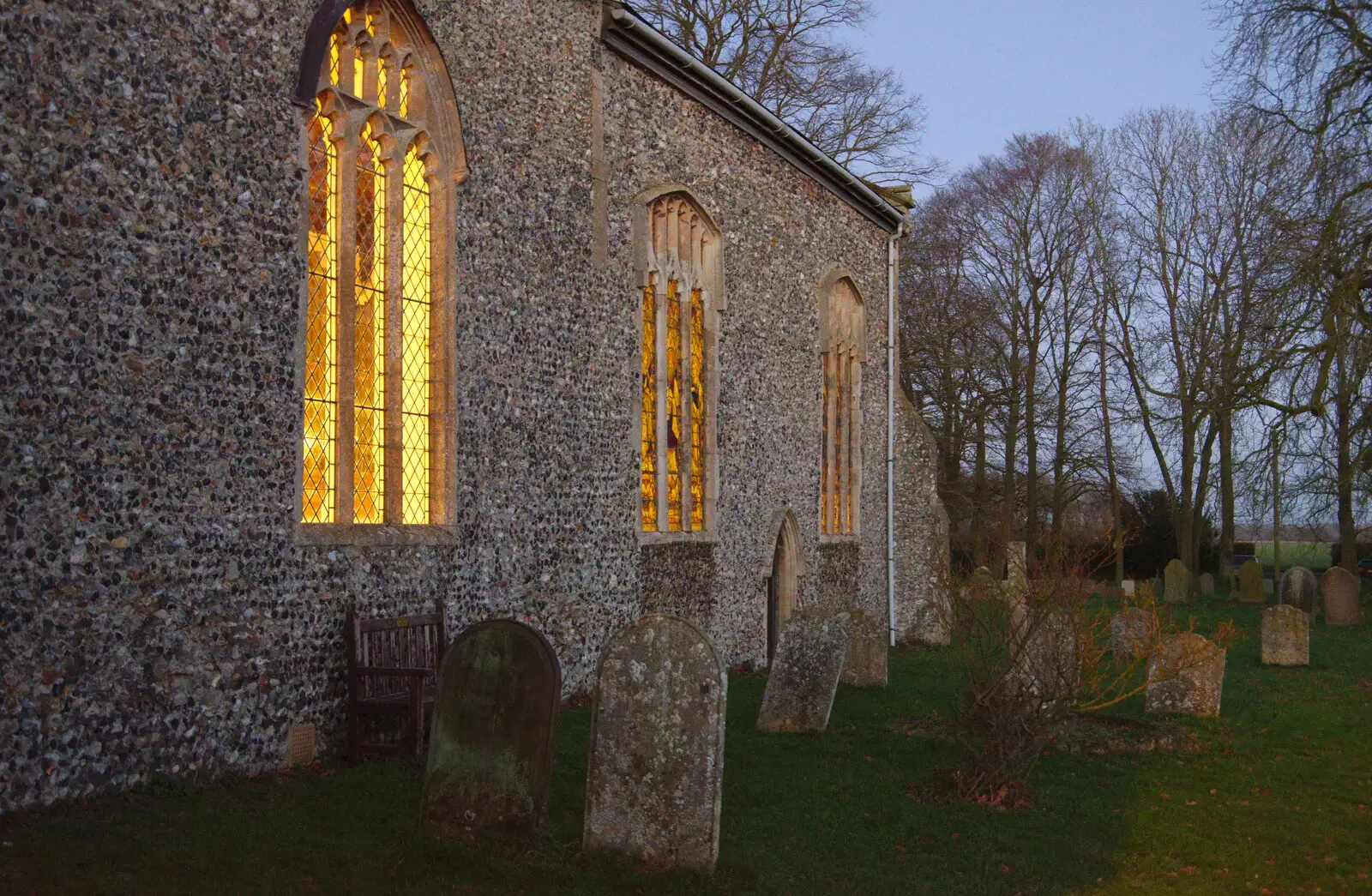 The church looks like it's bathed in a warm glow, from A Christingle Service, St. Nicholas Church, Oakley, Suffolk - 24th December 2019