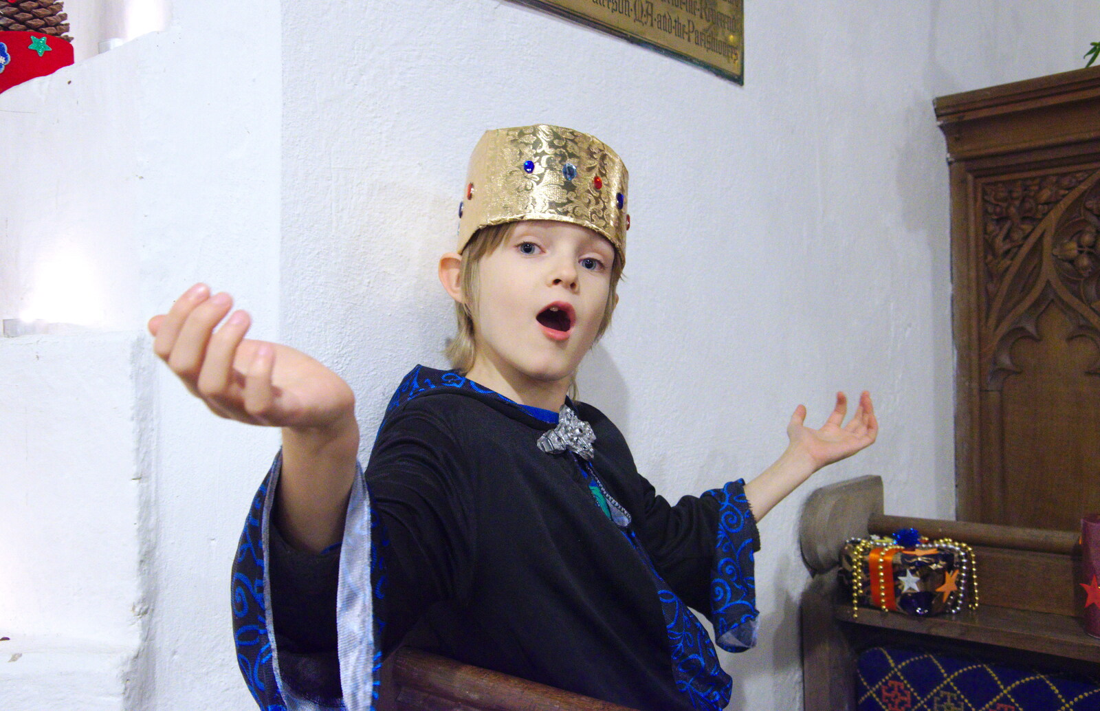 Harry is persuaded to play the part of a king from A Christingle Service, St. Nicholas Church, Oakley, Suffolk - 24th December 2019