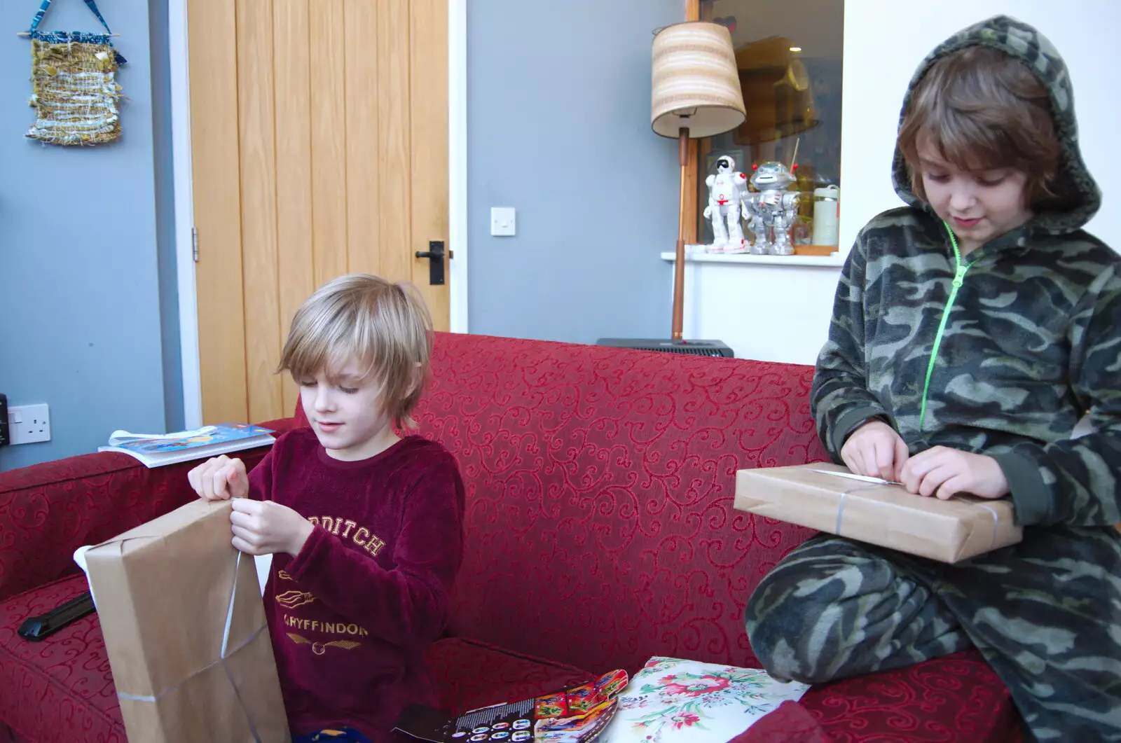 Harry and Fred make a start on presents, from Christmas Day, Brome, Suffolk - 25th December 2019