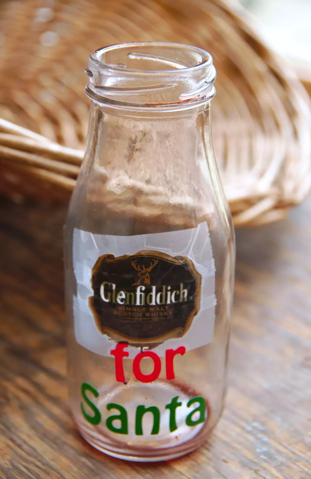 Isobel has fixed the 'milk for Santa' bottle, from Christmas Day, Brome, Suffolk - 25th December 2019