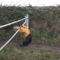 Fred gets stuck trying to limbo under a gate, To See the Seals, Horsey Gap, Norfolk - 10th January 2020