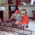 Cleaning out the fireplace in the lounge, Family History: Birtle's Close, Sandbach, Cheshire - 24th January 2020