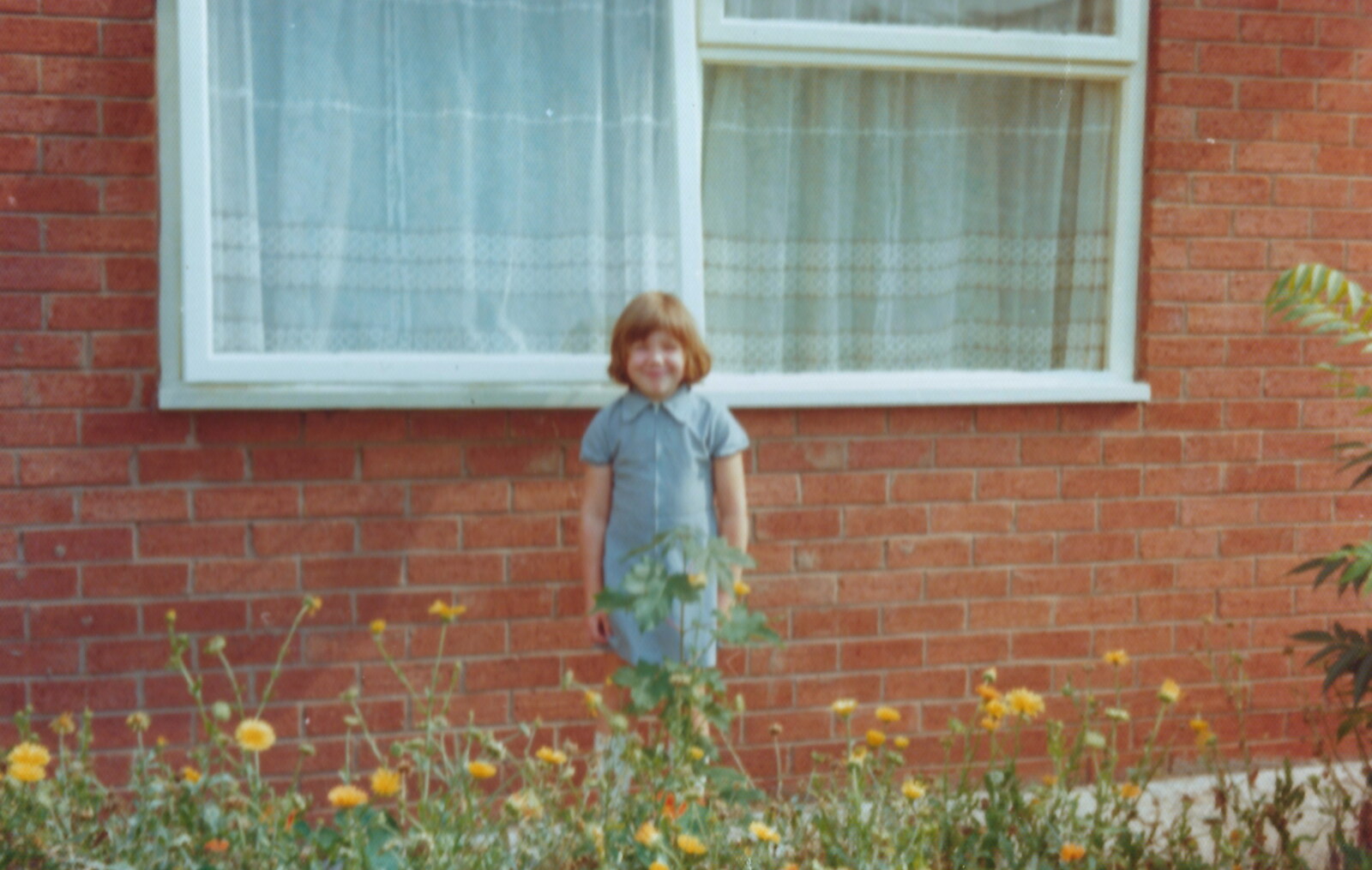 Family History: Birtle's Close, Sandbach, Cheshire - 24th January 2020: Sis stands in a flower bed