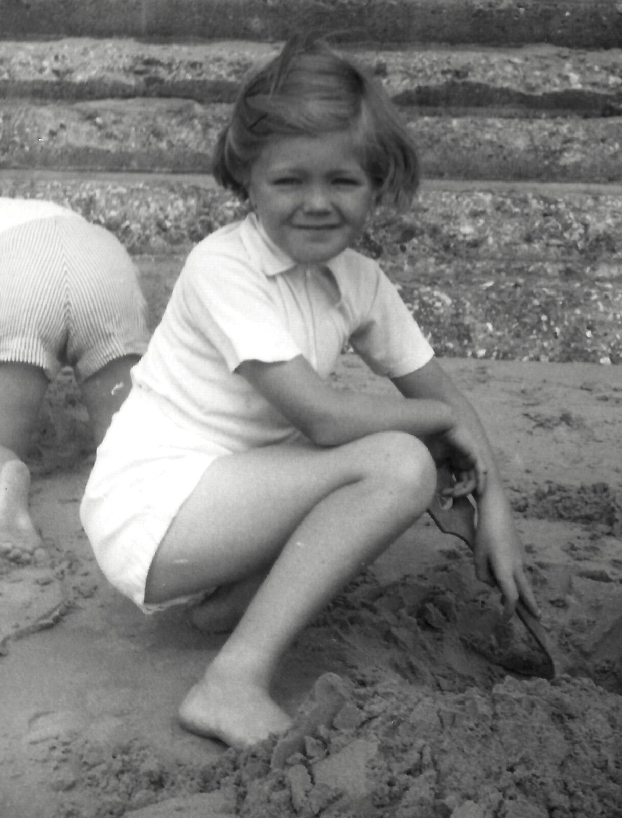 Janet in a sandpit from Family History: The 1940s and 1950s - 24th January 2020