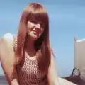 Janet on a beach somewhere, Family History: The 1960s - 24th January 2020