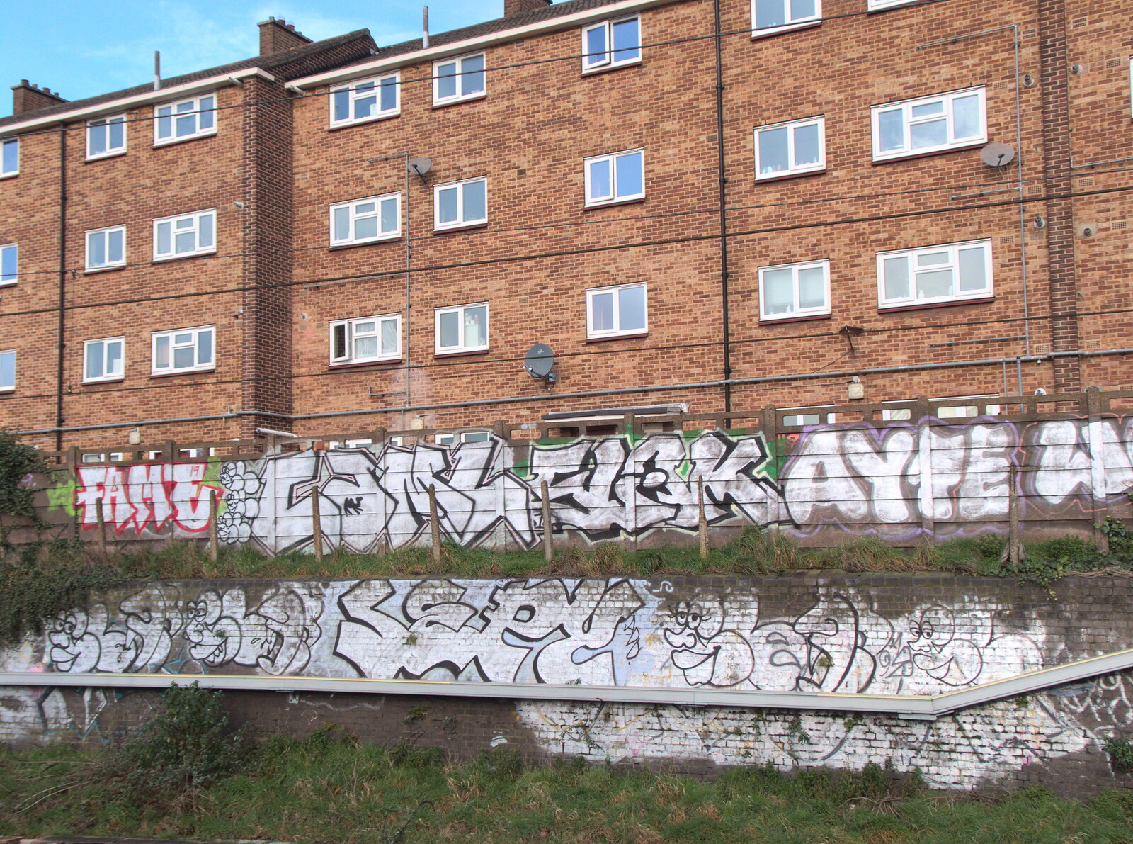 Broken-down Freight Trains, Manor Park, London - 28th January 2020: A mass of tags under a block of flats