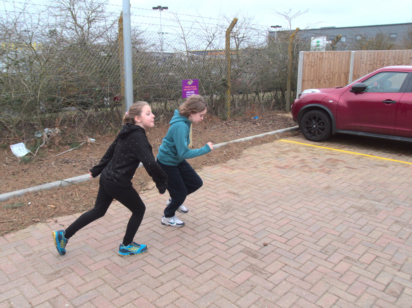 Sophie and Fred run around in the car park from Clip and Climb, The Havens, Ipswich - 15th February 2020