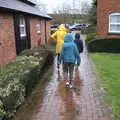 Heading off to the restaurant in the rain, A Trip to Harry Potter World, Leavesden, Hertfordshire - 16th February 2020