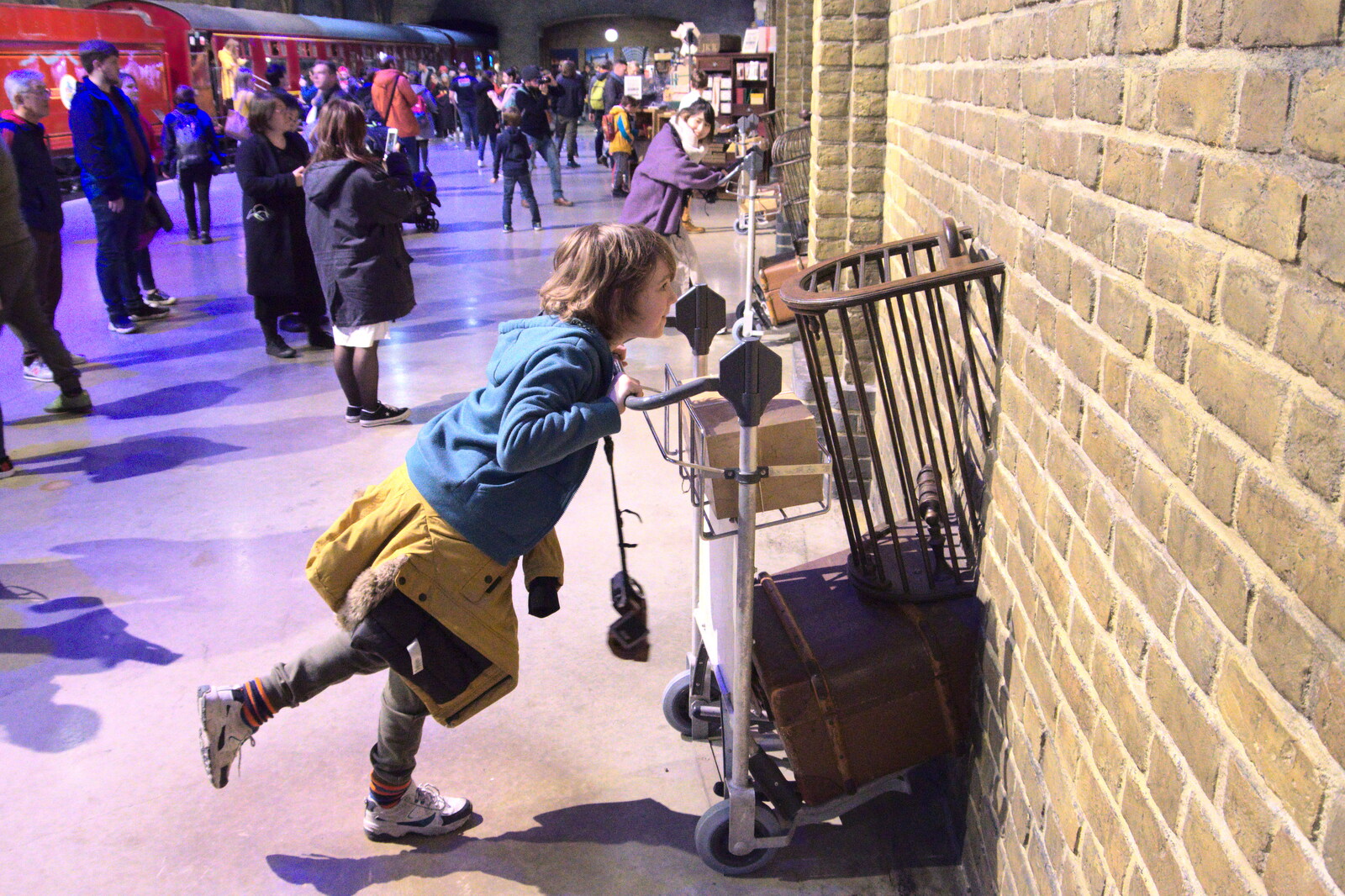 Fred pushes his trolley through the wall from A Trip to Harry Potter World, Leavesden, Hertfordshire - 16th February 2020