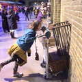 Fred pushes his trolley through the wall, A Trip to Harry Potter World, Leavesden, Hertfordshire - 16th February 2020