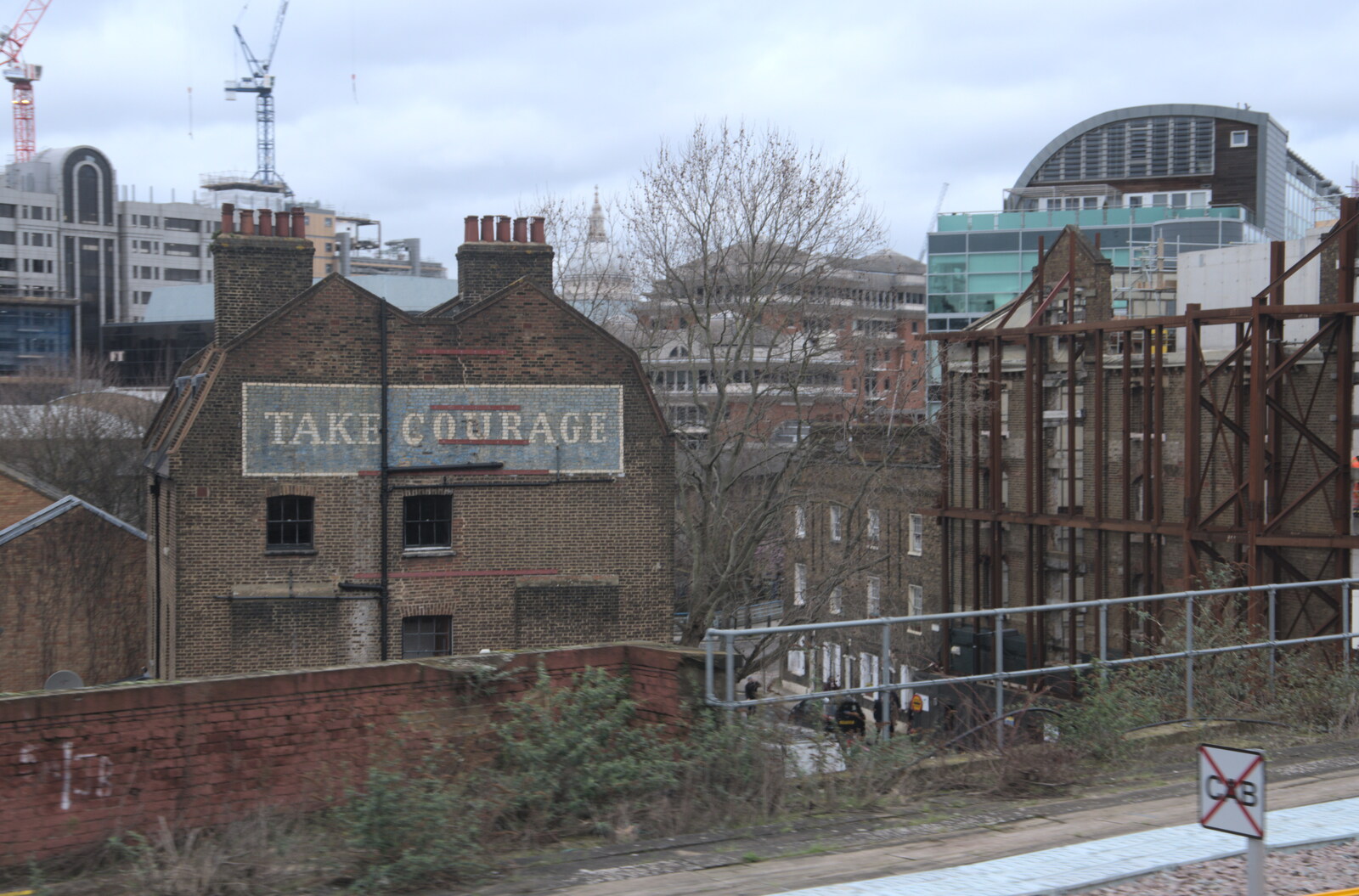 Take Courage wall advert near London Bridge from HMS Belfast and the South Bank, Southwark, London - 17th February 2020