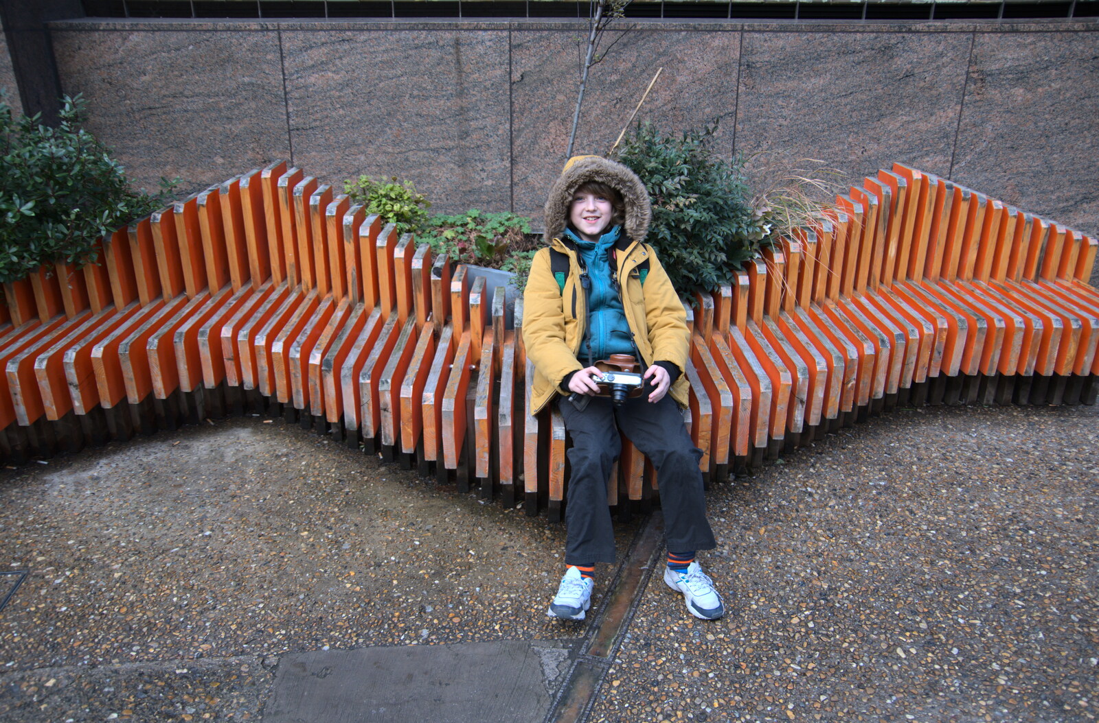 Fred sits on a funky sculpted wooden bench from HMS Belfast and the South Bank, Southwark, London - 17th February 2020