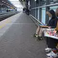 The boys read magazines as we wait for our train, HMS Belfast and the South Bank, Southwark, London - 17th February 2020