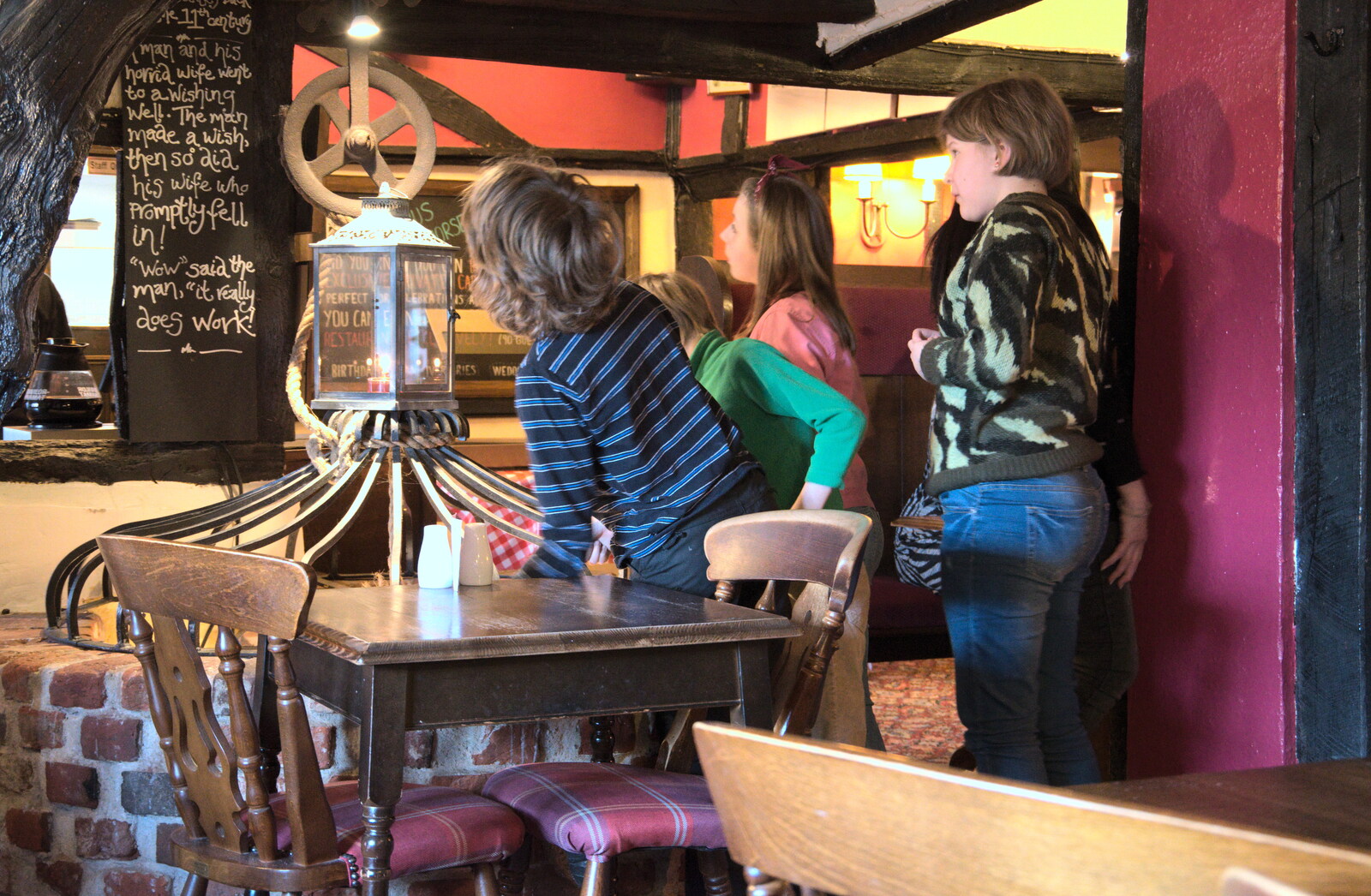 The kids look down the well from Sunday Lunch and a SwiftKey Trip to Nando's, Thornham and Bayswater - 22nd February 2020
